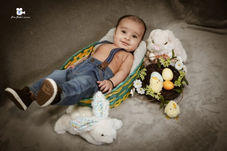 Smiling baby in Easter basket photoshoot with spring props, Kelowna family photographer
