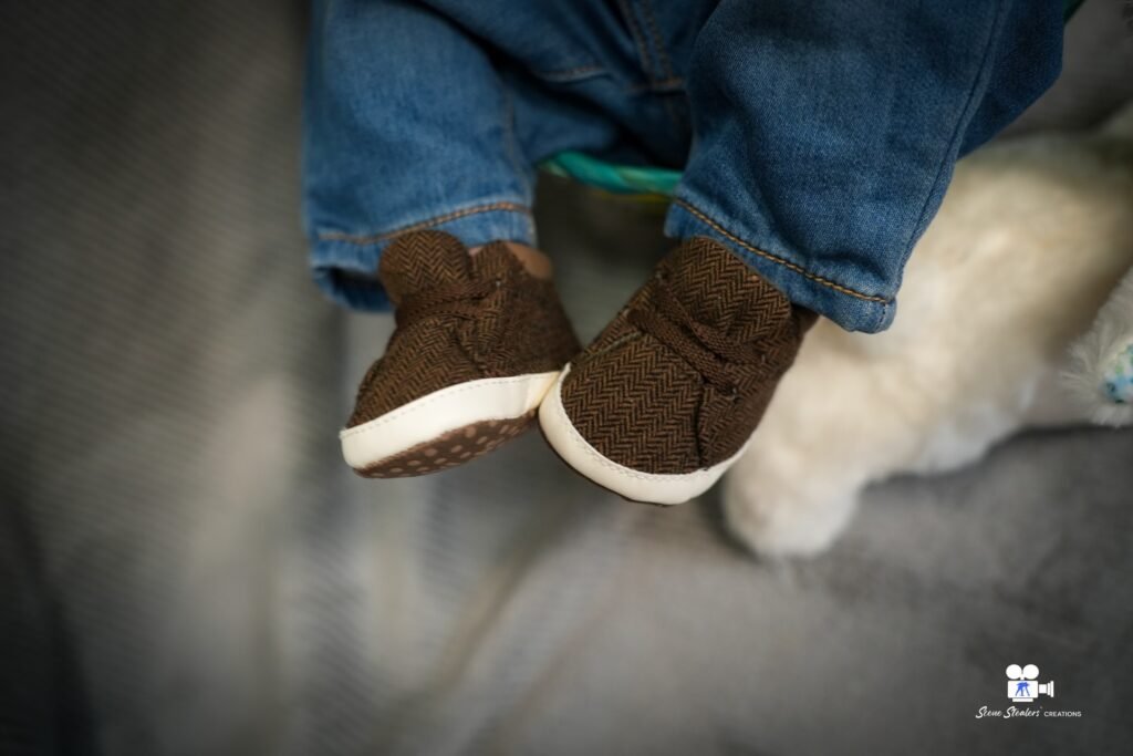 Close-up of baby's shoes during family photoshoot, newborn photography Kelowna
