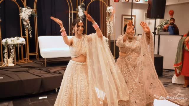 Bride dancing at a Kelowna wedding reception filmed by Scene Stealers Creations