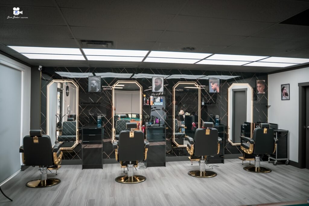 High Fade Barbers shop interior with styling chairs and mirrors, business photography